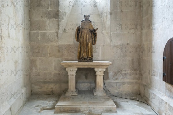 Alcobaca, Portugal - 7 April, 2022: the statue of Saint Stephen in one of the chapels of the church