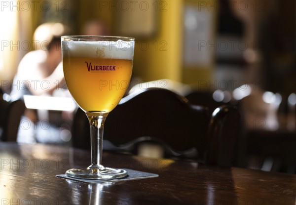 Kessel-Lo, Flemish Brabant Region, Belgium, 08 21 2022, Close up of an amber abbey beer called