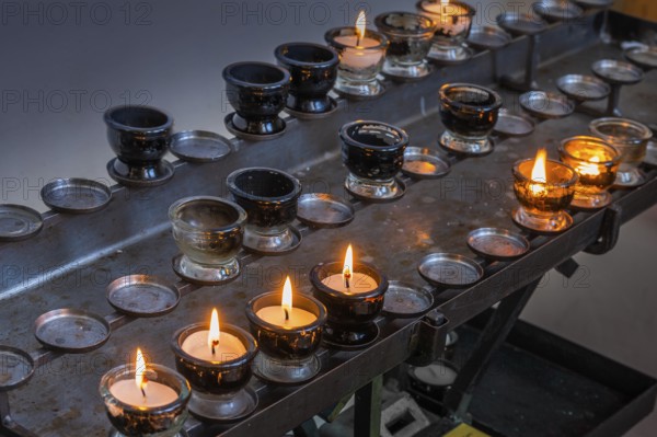 Sacrificial lights in the Catholic parish church of St Blasius in Dietmannsried, Allgäu, Bavaria,