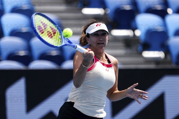 MELBOURNE, AUSTRALIA - JANUARY 10: Iva Majoli of Croatia partners Mansour Bahrami of France in the