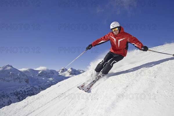 Skiers in action, Alps, Austria