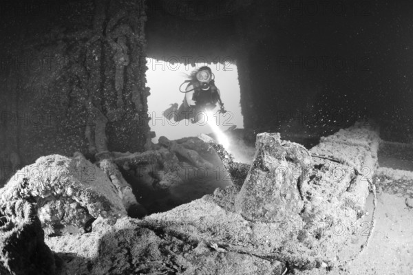 Diver finds teapot in the wreck of the HIJMS Nagato, Marshall Islands, Bikini Atoll, Micronesia,