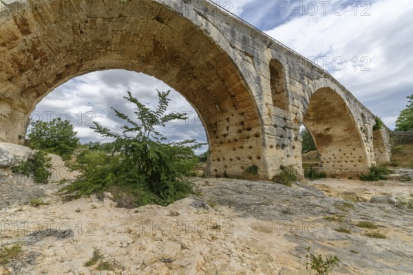 The Julien bridge, Roman bridge over the Calavon river. Roman bridge in the Luberon located on the