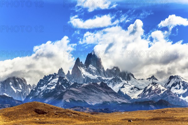 Argentine. Desert and mountains. The famous ridge Mount Fitz Roy in the clouds and the Patagonian