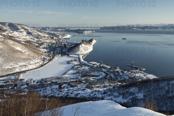 Beautiful winter Kamchatka landscape: top view of the Petropavlovsk-Kamchatsky City, Avacha Bay and