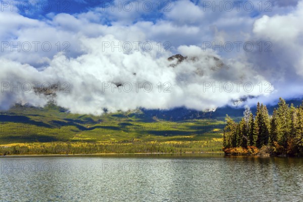 The lake is covered with light water ripples. Pyramid Lake. Cold sunny day in the Rocky Mountains