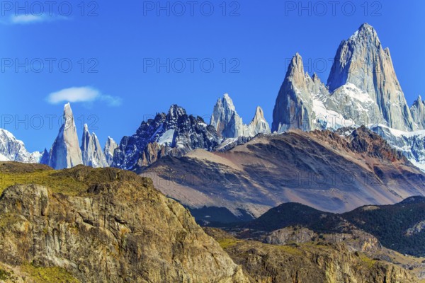 Picturesque mountain range, illuminated by the midday sun. Fitzroi - mountain peak in Patagonia in
