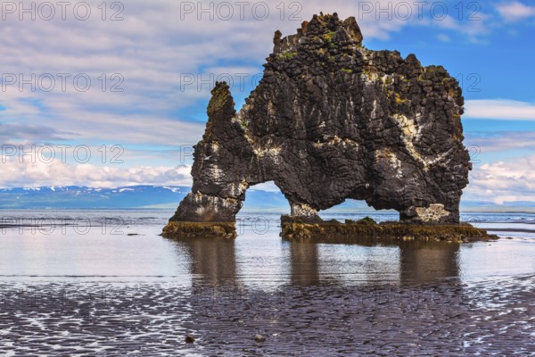 The picturesque cliff in Iceland as huge prehistoric monster. Remains of an ancient extinct volcano