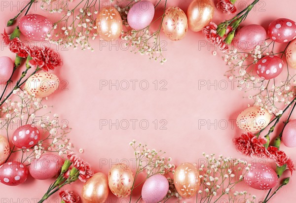Abstract Easter composition, spring banner with carnation flowers and painted eggs with place for