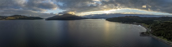 Evening mood at Loch Alsh with Tulach Ard hill and Skye Bridge, drone shot, Reraig, Kyle, Scotland,