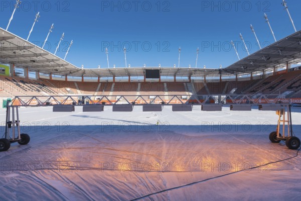 LUBIN, POLAND - MARCH 19, 2018: Stadium Zaglebie with covered turf to protect against frost and