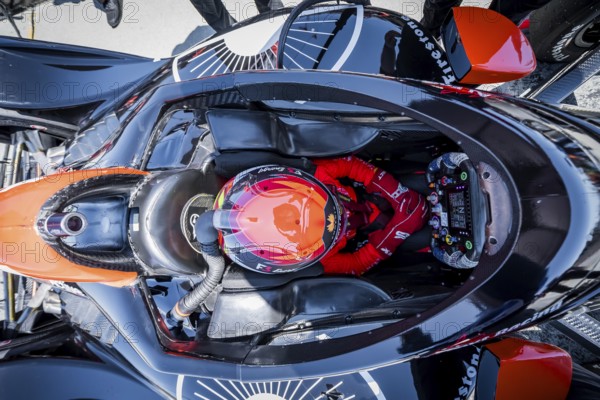 SANTINO FERRUCCI (14) of Woodbury, Connecticut straps into his vehicle as he prepares to practice