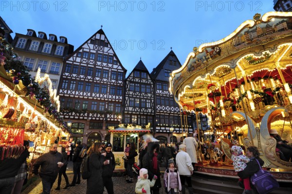Christmas market, carousel and half-timbered houses at the Römer, Römerberg, Old Town, Frankfurt am