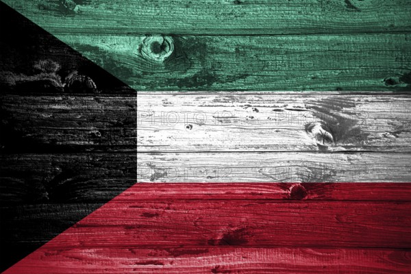 Kuwait flag on wooden planks background wood flag