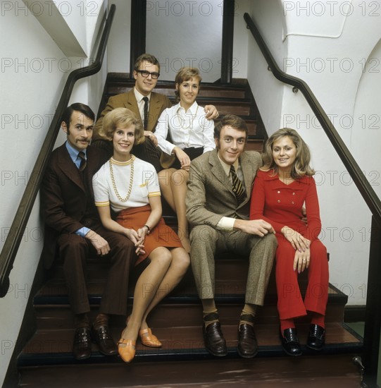1960s parents. Three couples are sitting together in a stairway. Sweden november 13 1969. ref