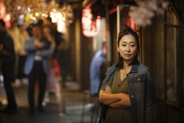 TOKYO, JAPAN - MAY 12, 2019 - People working in bars in Omoide Yokocho or 'Piss Alley' which is a