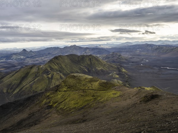 View from Mount Sveinstindur, volcanic landscape, moss-covered hills, mountains, Icelandic