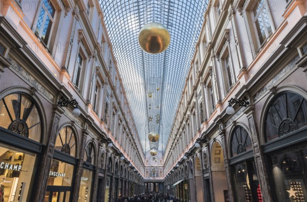 Brussels, Belgium, 12 18 2018: Glass roof and facades of the Saint Hubertus Gallery in Art Nouveau
