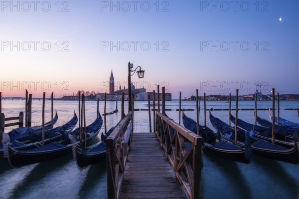 Dawn, Venetian gondolas with the church of San Giorgio Maggiore in the background, Venice, UNESCO