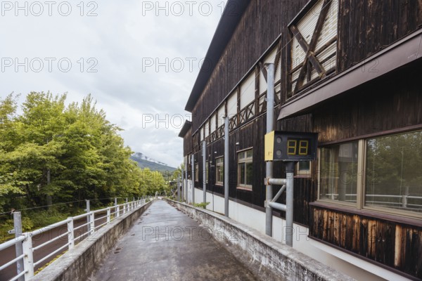 IIZUNA, JAPAN - SEPTEMBER 19, 2024: The now abandoned Nagano 1998 Olympic Spiral luge bobsleigh