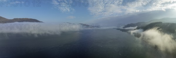 Morning fog over Loch Linnhe at the narrows near Ardgour, drone image, Western Highlands, Scotland,
