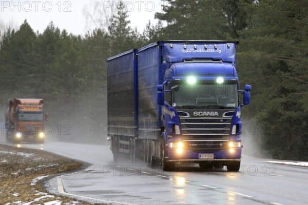 SALO, FINLAND, MARCH 4, 2017: Blue Scania R620 combination vehicle of M. Keskimaki and another
