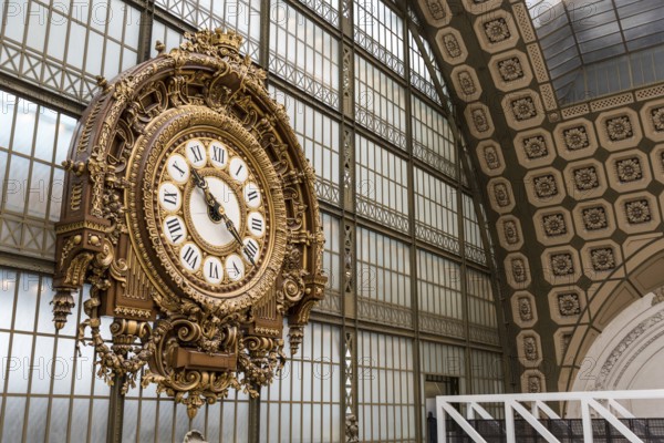 PARIS, FRANCE, MAY 29, 2022, Ornate clock at the main hall of famous museum d'Orsay in Paris,