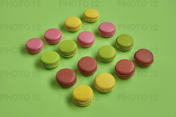 Top view of a yummy macarons or macaroons, sweet meringue-based confection with a ganache,