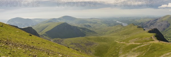 Walking down from Mount Snowdon on the Llanberis Path, Snowdonia, Gwynedd, Wales, UK, looking north