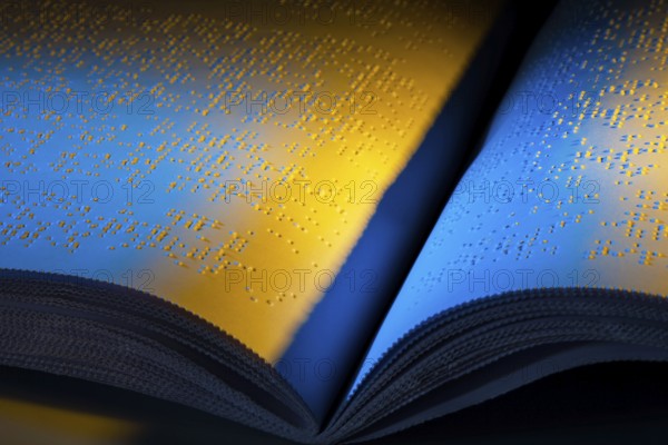 A book written in Braille for the blind. Braille for the blind, A book written in Braille. Braille