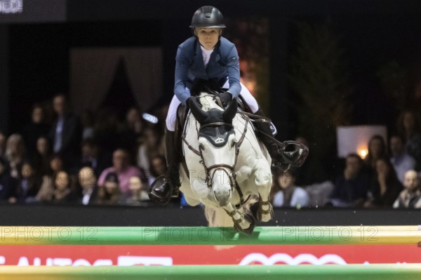Zascha Nygaard Lill of Denmark competes in the equestrian Audi Grand Prix at Jumping International