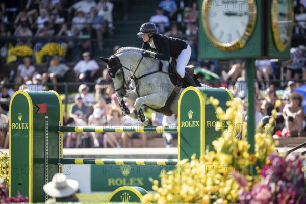 Martin Fuchs of Switzerland and riding Leone Jei compete in the first round of the 1.60m CPKC