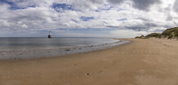 Lighthouse in the sea, Rattray Head Lighthouse, Peterhead, Aberdeenshire, Scotland, Great Britain