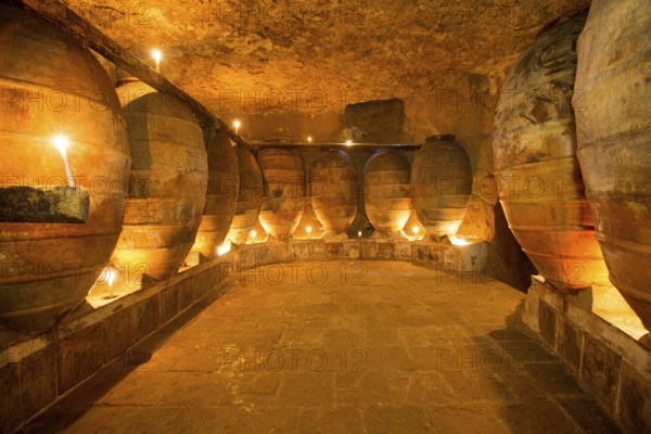 Antique winery in Spain with clay vessels terracotta amphora pots Mediterranean tradition with