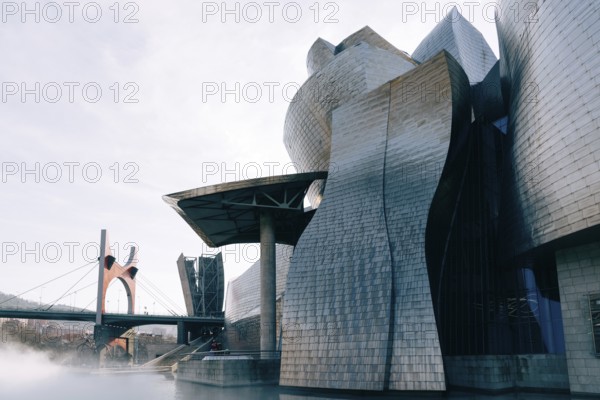 Bilbao, Spain, February 13, 2022: Exterior view of Guggenheim Museum designed built by Frank Gehry