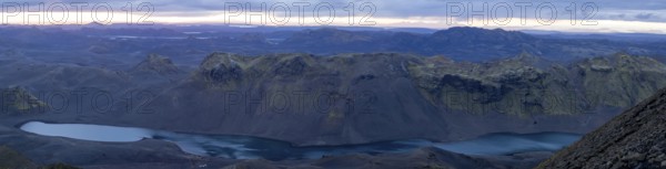 Cloudy mood and evening light, view from Mount Sveinstindur, volcanic landscape, Lake Langisjór,