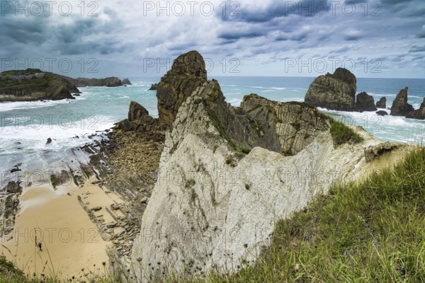 Cantabria. Noon on the beach of Playa di Arnia, Spain. Windy stormy day on the Atlantic coast.
