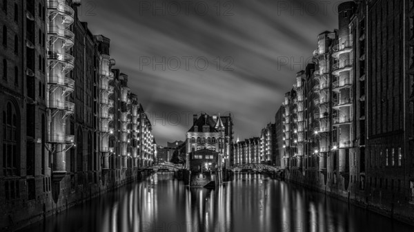The moated castle in the Speicherstadt, photographed from the Poggemühlenbrücke bridge