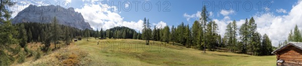 Typical alp with a hay shed in the Dolomite Alps in the Fanes Sennes Prags Nature Park, South Tirol