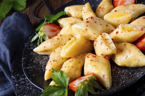 Kopytka Polish potato dumplings with strawberries