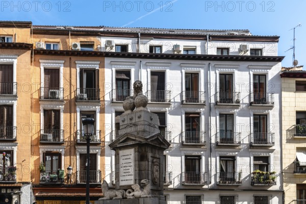 Madrid, Spain, November 1, 2020: Old residential building with iron balconies in the downtown of