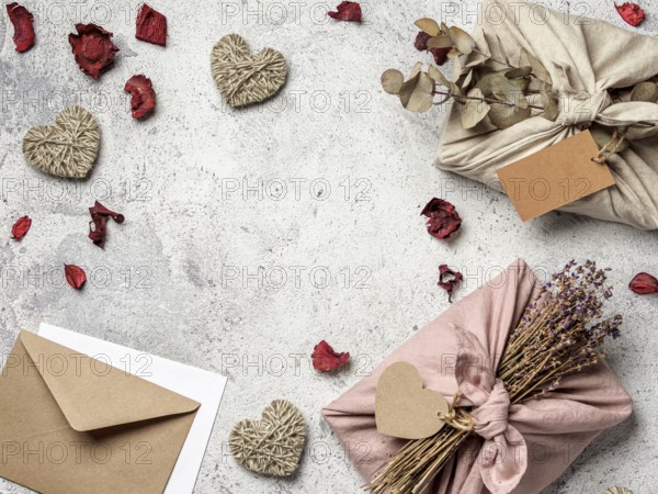 Zero waste Valentine's Day gift ideas concept. Eco-friendly gift cloth wrapping in Furoshiki style
