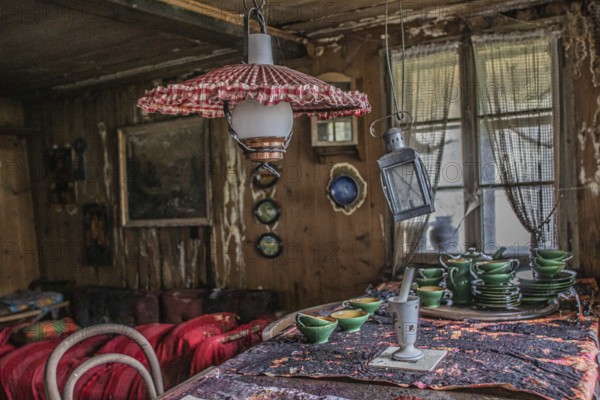 Impressions from the parlour, living room in a lost place, approx. 300 year old farmhouse that has
