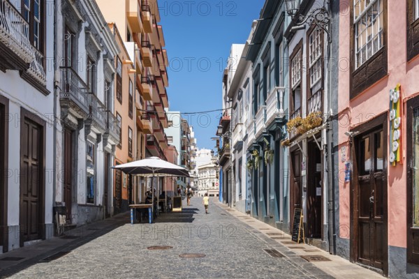 Santa Cruz de La Palma, Spain, August 13, 2021: Shopping street with stores and restaurants in the