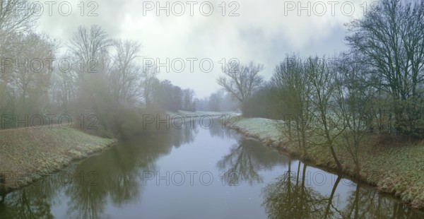 Fog and mist at dusk along the River Nidda in Frankfurt, Frankfurt am Main, Germany