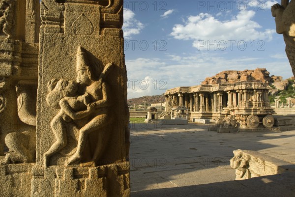 Erotic panel on pillar in Kalyana Mandapa and Stone Chariot in Vitthala temple, Hampi, Karnataka,