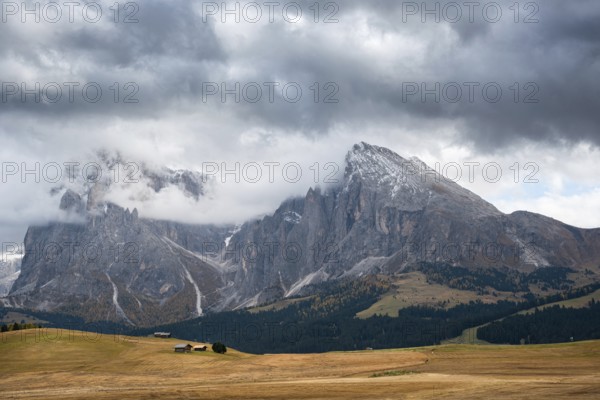 Landscape with beautiful autumn meadow field and the amazing Dolomite rocky peaks the valley of