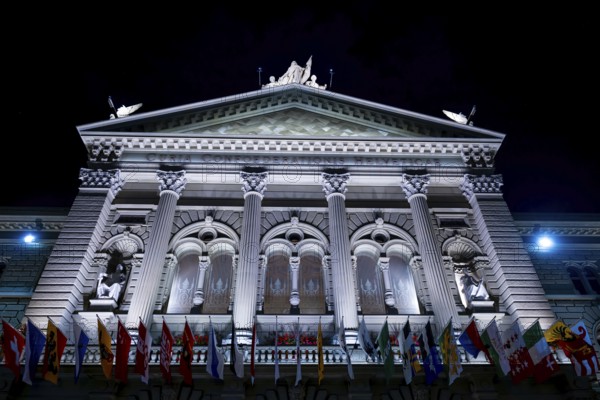 Beautiful Bundeshaus Illuminated Parliament Building or Federal Palace with Canton Flags at Night