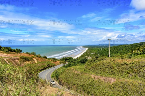 Road along the coast of the state of Bahia next to the beaches of Pe de Serra and Sargi in Serra