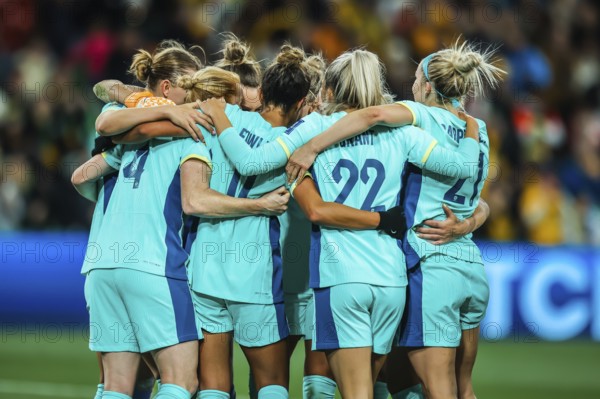 MELBOURNE, AUSTRALIA, JULY 31: Australia players celebrate beating Canada at the FIFA Women's World